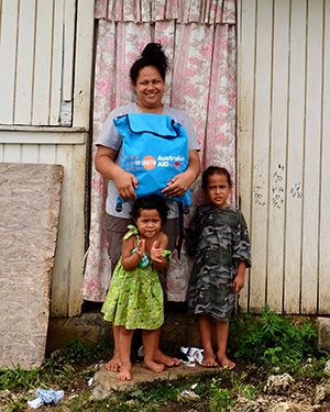 family outside house